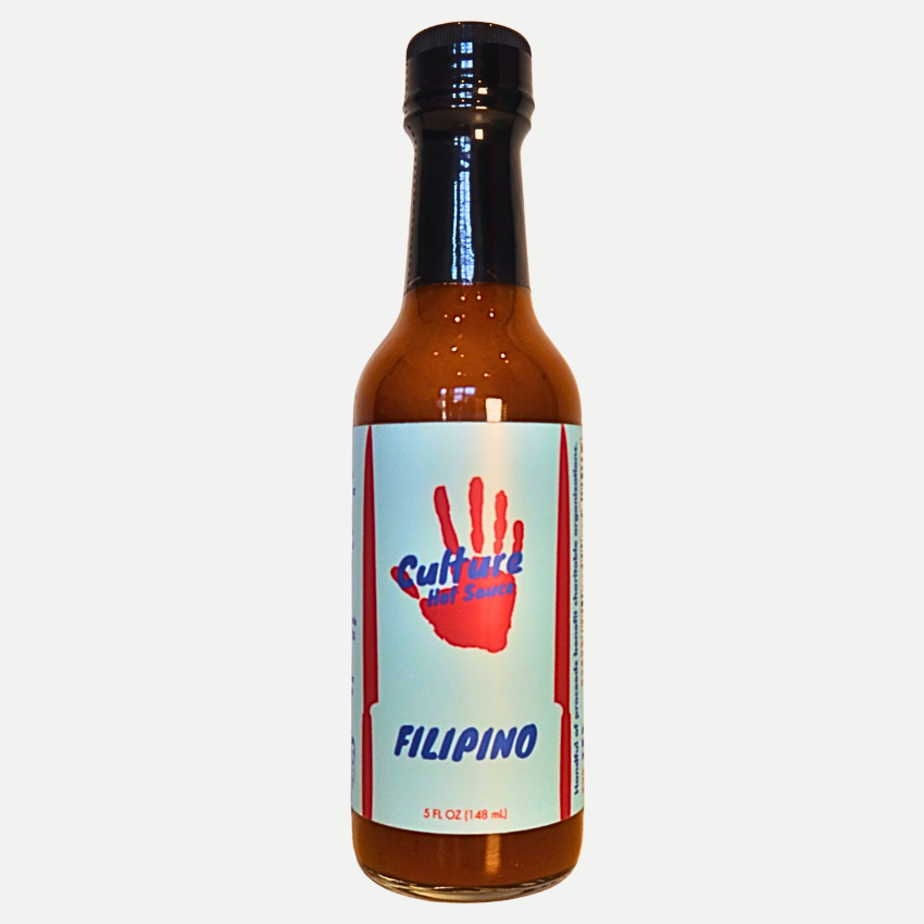 Experience a Filipino-inspired burst of flavor with this Adobo-inspired hot sauce. Crafted to be both authentic and versatile, this sauce is tangy, sweet, savory, and deeply flavorful. Made with cane vinegar, soy sauce, bay leaves, black pepper, onion, and garlic, it captures the essence of Filipino adobo while complementing a variety of dishes.