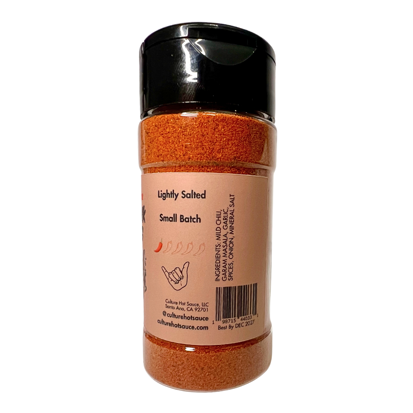 Kitchen Sink Seasoning – a warm, sweet, earthy, and pungent spice blend with mild chili, garam masala, garlic, onion, mineral salt, and aromatic spices. This lightly salted, all-encompassing blend enhances lamb, potatoes, meats, stews, chicken, beef, cauliflower, squash, hummus, casseroles, vegetables, and ribs. Perfect for adding depth and balance to any dish! Spice jar side