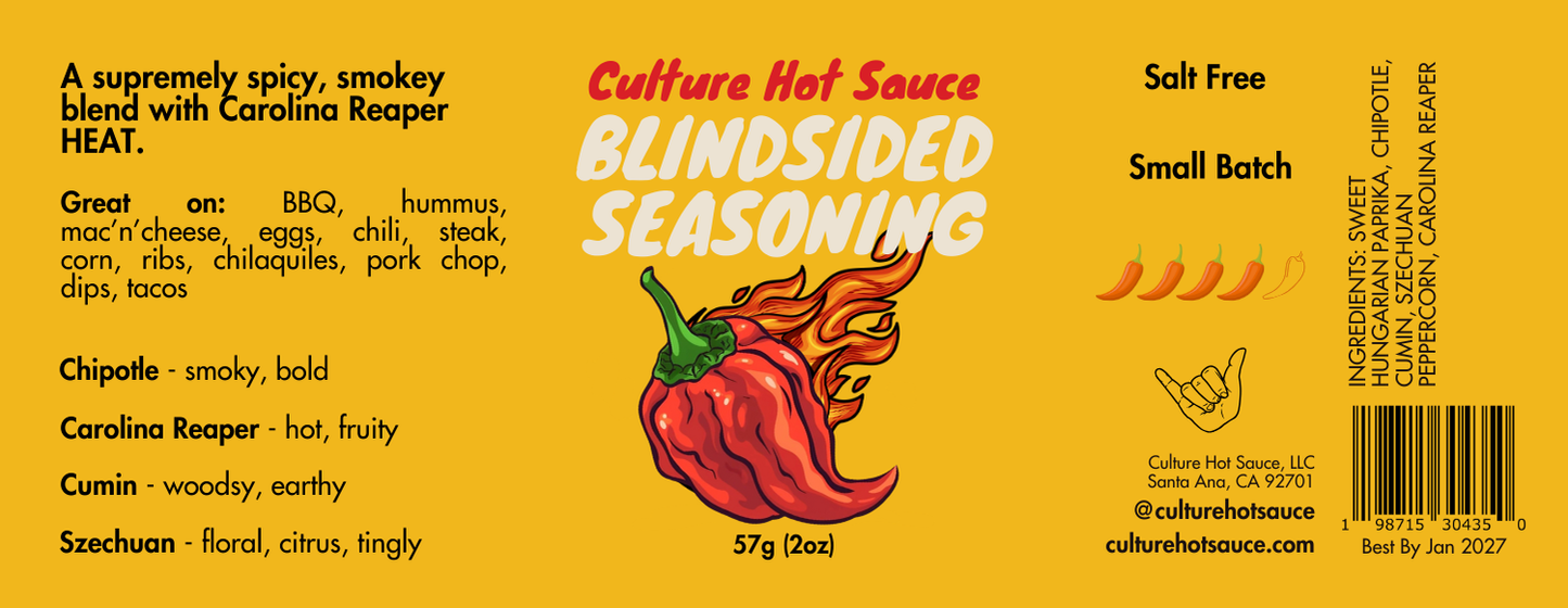 Blindsided Seasoning – a bold, supremely spicy, and smoky blend inspired by our hottest and most popular sauce. Featuring Carolina Reaper heat with sweet Hungarian paprika, chipotle, cumin, and Szechuan peppercorn, this salt-free mix delivers a hot, vibrant flavor with a lingering smoky kick. Perfect for BBQ, hummus, mac 'n' cheese, eggs, chili, steak, corn, ribs, chilaquiles, pork chops, dips, and tacos. Family farm sourced, fresh ground, with no preservatives or additives—pure fire in every bite! label