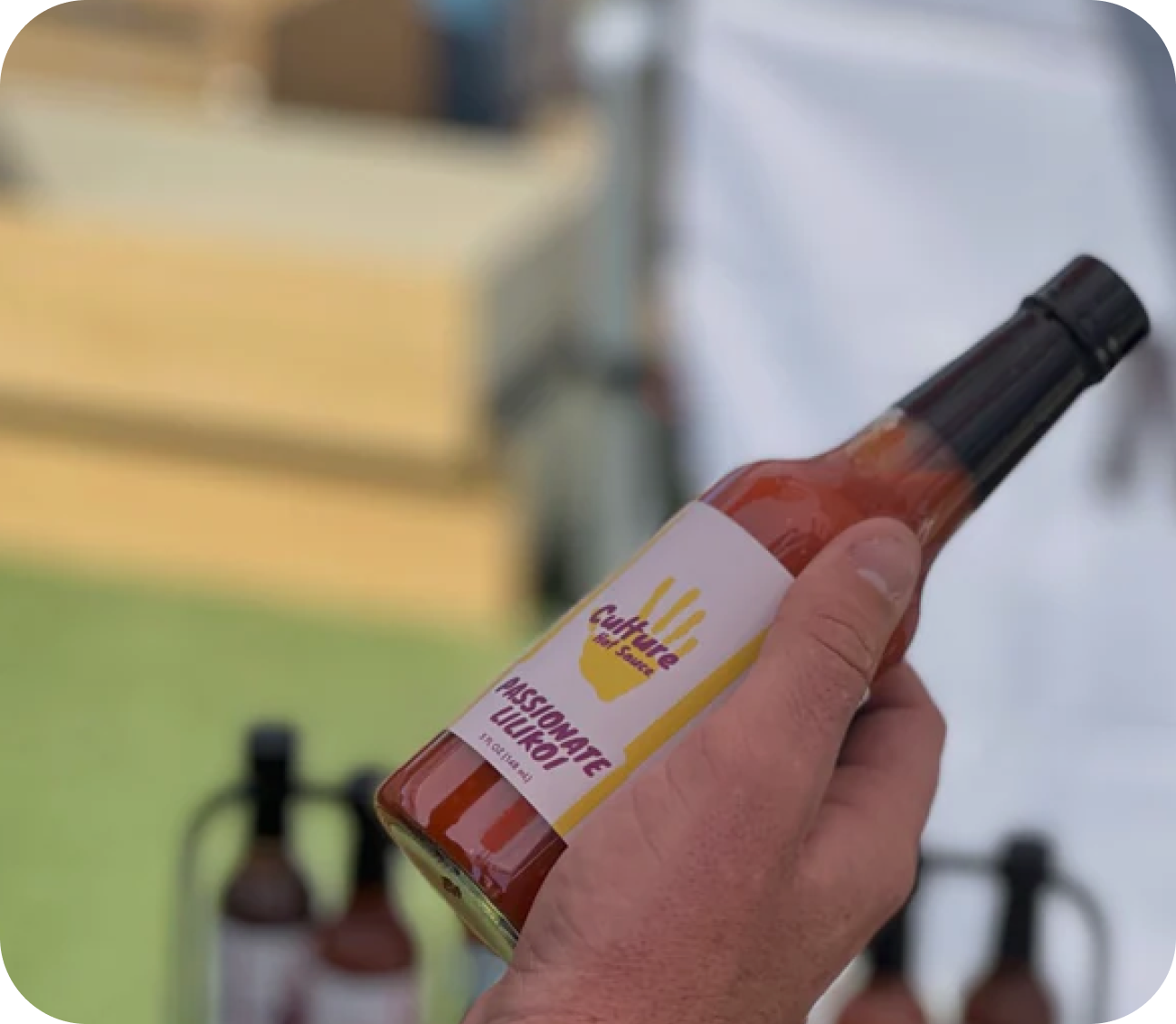 photo of culture hot sauce passion fruit at farmer's market