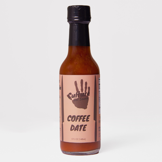 Experience the bold fusion of fresh roasted coffee and sun-dried desert dates in our artisan Coffee & Dates Hot Sauce. Made with locally sourced California chilis, this sauce delivers rich, deep flavors reminiscent of enchilada and mole sauces. 
 Perfect for elevating your favorite café staples like bagels, breakfast burritos, and savory pastries—or adding complex depth to a perfectly cooked steak.
Great on: Bagels, breakfast dishes, eggs, steak, avocado toast.
Ingredients: Vinegar, coffee, chilies, dates,