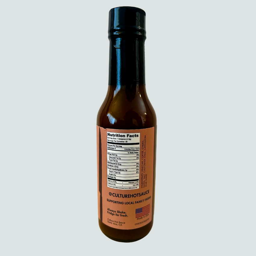 Experience the bold fusion of fresh roasted coffee and sun-dried desert dates in our artisan Coffee & Dates Hot Sauce. Made with locally sourced California chilis, this sauce delivers rich, deep flavors reminiscent of enchilada and mole sauces. 
 Perfect for elevating your favorite café staples like bagels, breakfast burritos, and savory pastries—or adding complex depth to a perfectly cooked steak.
Great on: Bagels, breakfast dishes, eggs, steak, avocado toast.
Ingredients: Vinegar, coffee, chilies, dates,