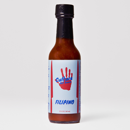 Experience a Filipino-inspired burst of flavor with this Adobo-inspired hot sauce.  Crafted to be both authentic and versatile, this sauce is tangy, sweet, savory, and deeply flavorful.  Made with cane vinegar, soy sauce, bay leaves, black pepper, onion, and garlic, it captures the essence of Filipino adobo while complementing a variety of dishes.