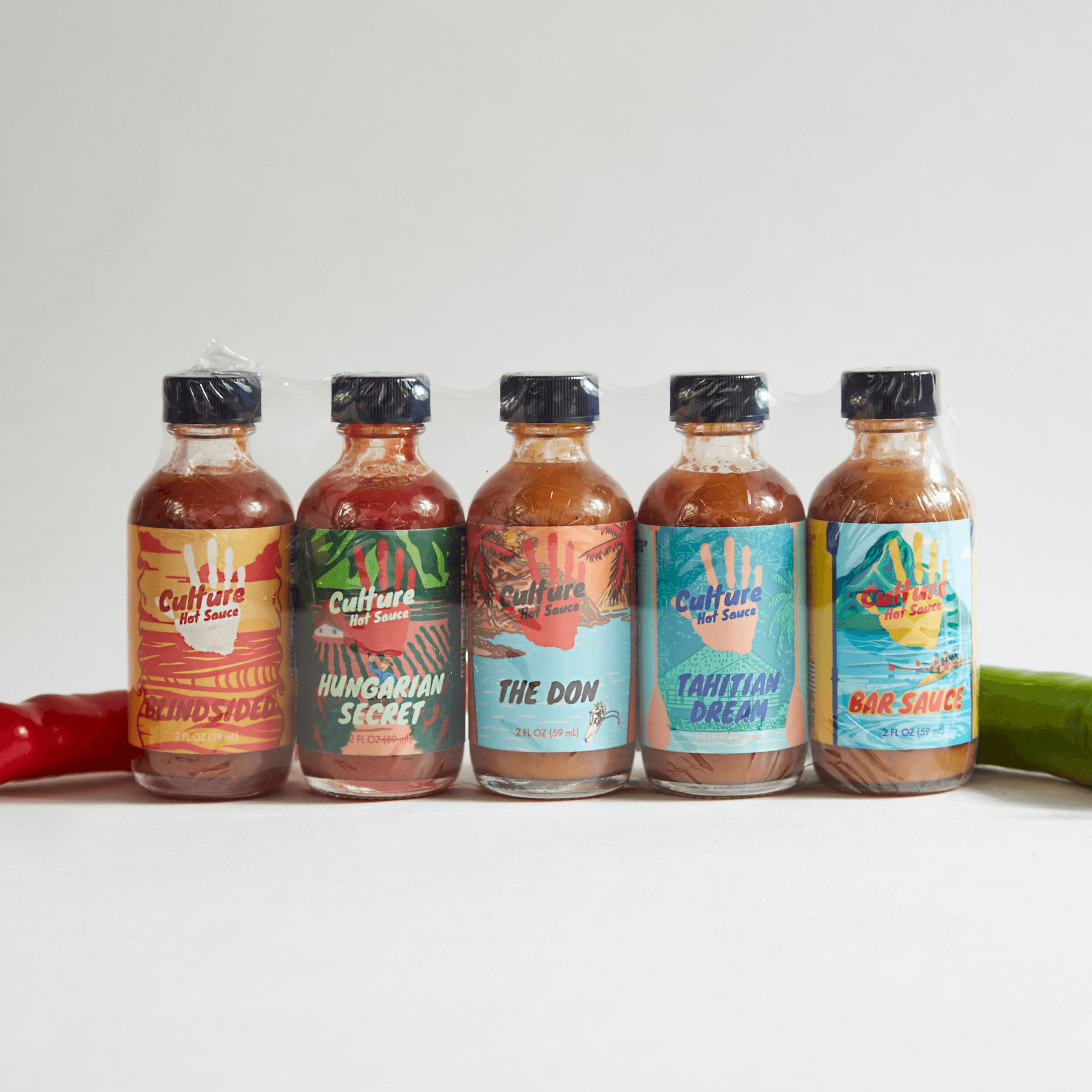 Gift Sampler Pack – A curated selection of 5 bestselling hot sauces (Bar Sauce, The Don, Tahitian Dream, Blindsided, and a seasonal flavor) in one set.  Featuring the original classic, chef’s favorite, spiciest, best seller, and a rotating seasonal selection, this pack offers a versatile range of flavors to complement any dish.
Each bottle is 2oz, totaling 10oz of sauce, making it the perfect way to explore our most-loved sauces.
Great for beef, chicken, fish, sandwiches, burritos, and more—food pair set 