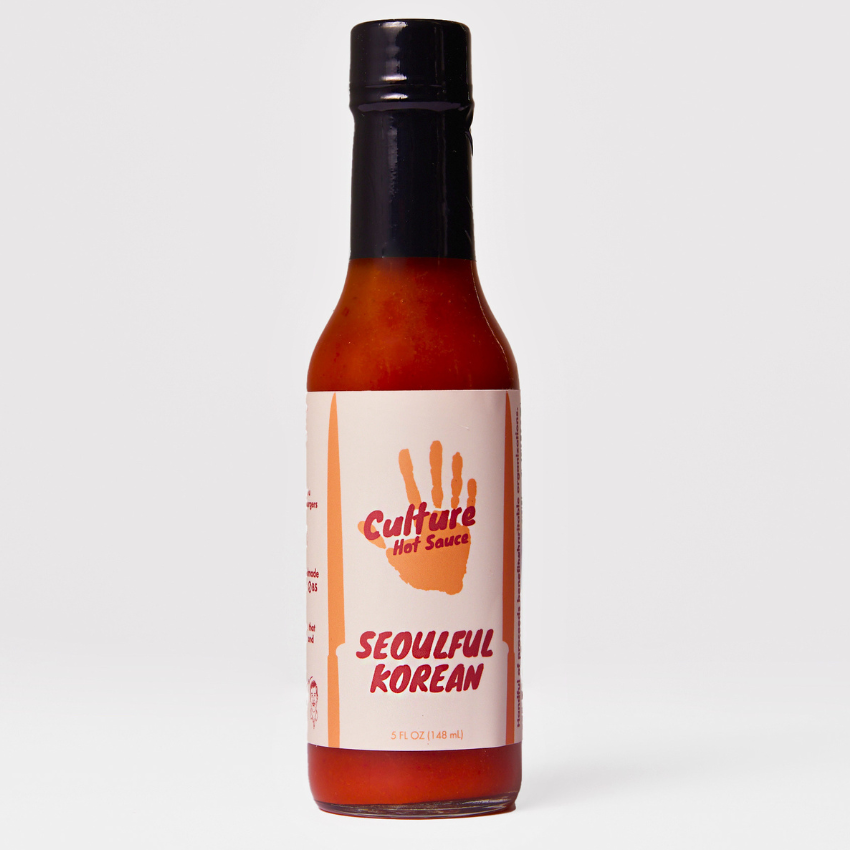 Hot sauce bottle of Seoulful Korean by Culture Hot Sauce.  A bold and exciting ginger and kimchi sauce with bright, zesty flavors.  Perfect for those who love the punch of fresh ginger!

Made with fermented kimchi featuring kelp instead of fish for a fresh, clean taste. Balanced with rice vinegar, Korean chilis, white melon, and dried gochugaru pepper for a savory, umami-packed depth.

Great on: Rice, noodles, stir-fries, tofu, KBBQ, dumplings, and more!