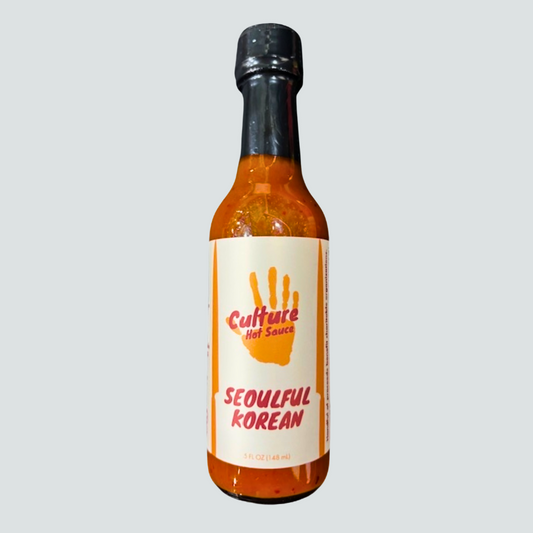 Hot sauce bottle of Seoulful Korean by Culture Hot Sauce.  A bold and exciting ginger and kimchi sauce with bright, zesty flavors.  Perfect for those who love the punch of fresh ginger!

Made with fermented kimchi featuring kelp instead of fish for a fresh, clean taste. Balanced with rice vinegar, Korean chilis, white melon, and dried gochugaru pepper for a savory, umami-packed depth.

Great on: Rice, noodles, stir-fries, tofu, KBBQ, dumplings, and more!