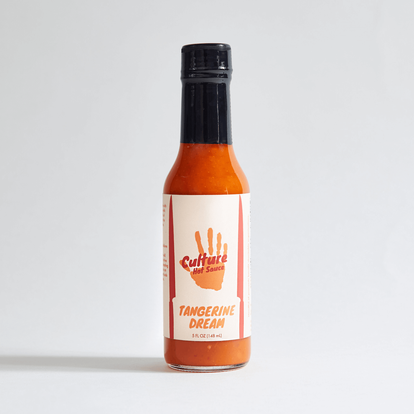 Tangerine Dream Culture Hot Sauce – A bright tangerine citrus base with a hint of yuzu, sweet peppers, and silky coconut cream for a smooth, slightly sweet flavor profile. This vibrant sauce is perfect for those who crave a balanced blend of citrusy brightness and savory depth.
Ingredients: Onion, Tangerine, Vinegar, Sweet Pepper, Coconut Cream, Garden Peppers, Sea Salt, Lemon, Lime, Paprika, Yuzu, White Pepper, Szechuan Peppercorn
Pair: Eggs, ceviche, fish, breakfast, pork, hot dogs, quesadillas, chicken