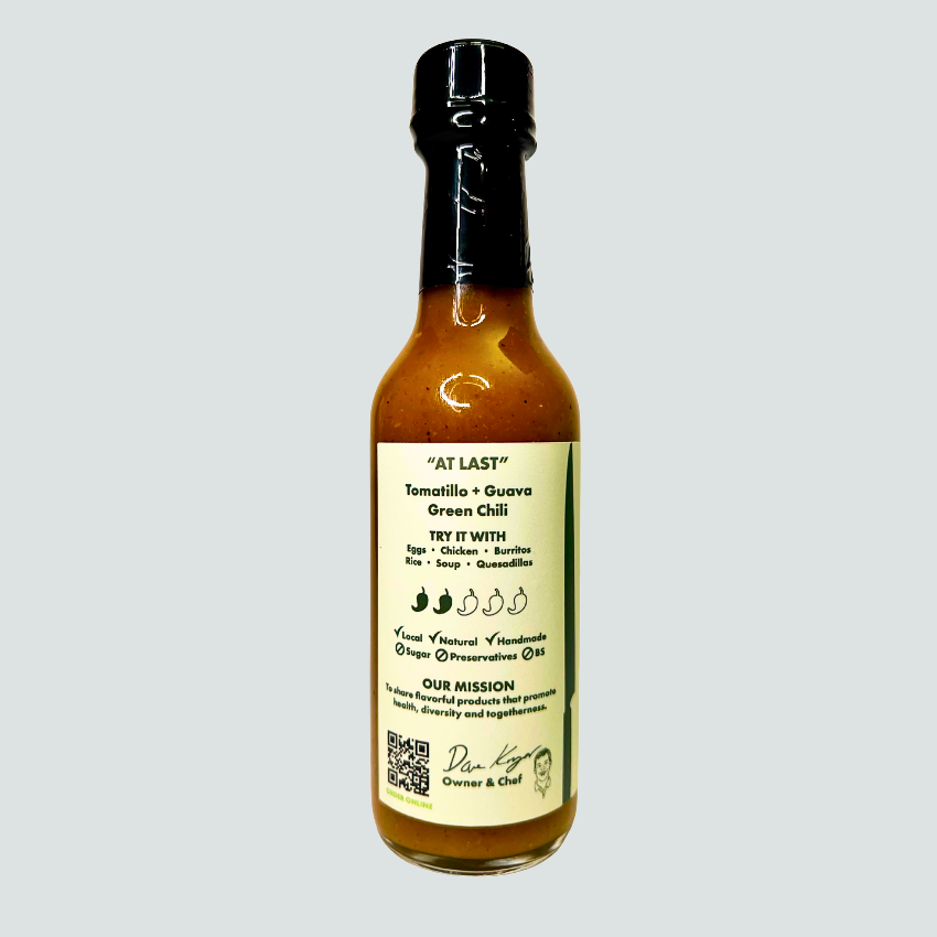 Roasted tomatillo and serrano peppers paired with sweet pineapple guava for a unique verde sauce.  This vibrant, medium-heat sauce includes ingredients like vinegar, jalapeño, aji amarillo, and black peppercorn.  Perfect for eggs, chicken, burritos, rice, soup, quesadillas, and salmon. side label