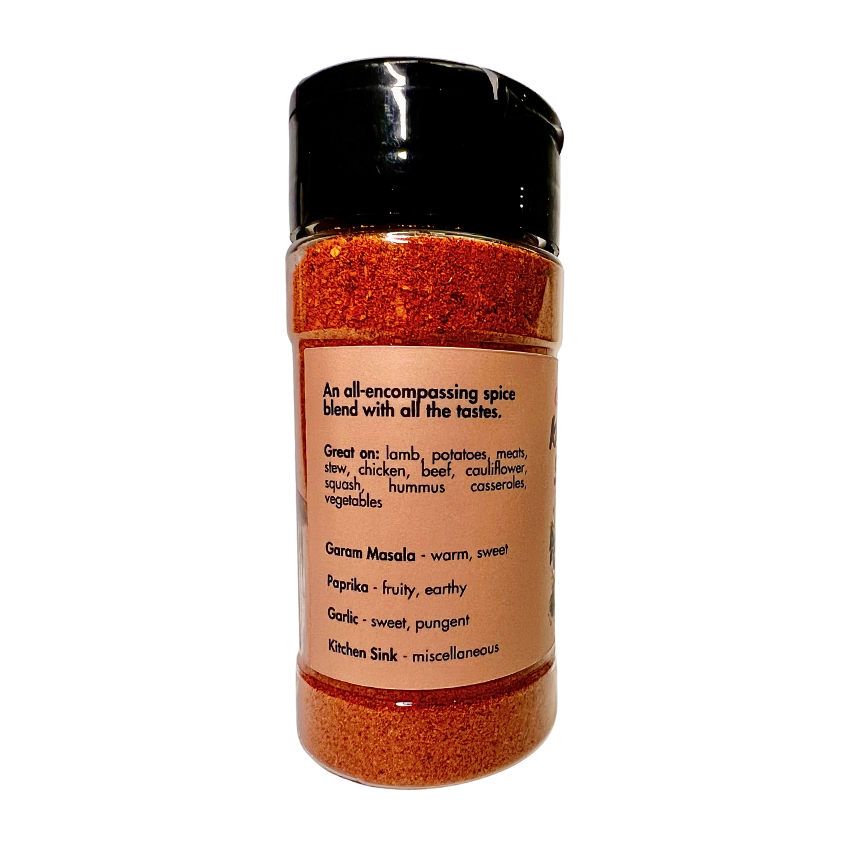 Kitchen Sink Seasoning – a warm, sweet, earthy, and pungent spice blend with mild chili, garam masala, garlic, onion, mineral salt, and aromatic spices.  This lightly salted, all-encompassing blend enhances lamb, potatoes, meats, stews, chicken, beef, cauliflower, squash, hummus, casseroles, vegetables, and ribs.  Perfect for adding depth and balance to any dish!  Spice jar side