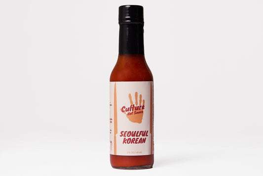 Hot sauce bottle of Seoulful Korean by Culture Hot Sauce.  A bold and exciting ginger and kimchi sauce with bright, zesty flavors.  Perfect for those who love the punch of fresh ginger!

Made with fermented kimchi featuring kelp instead of fish for a fresh, clean taste. Balanced with rice vinegar, Korean chilis, white melon, and dried gochugaru pepper for a savory, umami-packed depth.

Great on: Rice, noodles, stir-fries, tofu, KBBQ, dumplings, and more!